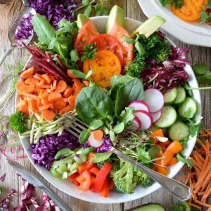 salad with greens, radishes, carrots